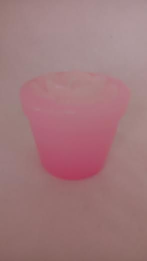 Vela decorativa rosa e branca